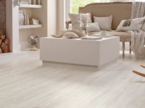 Vinyl flooring in a bright living room - see product options at Richmond Carpet in West Richmond IN